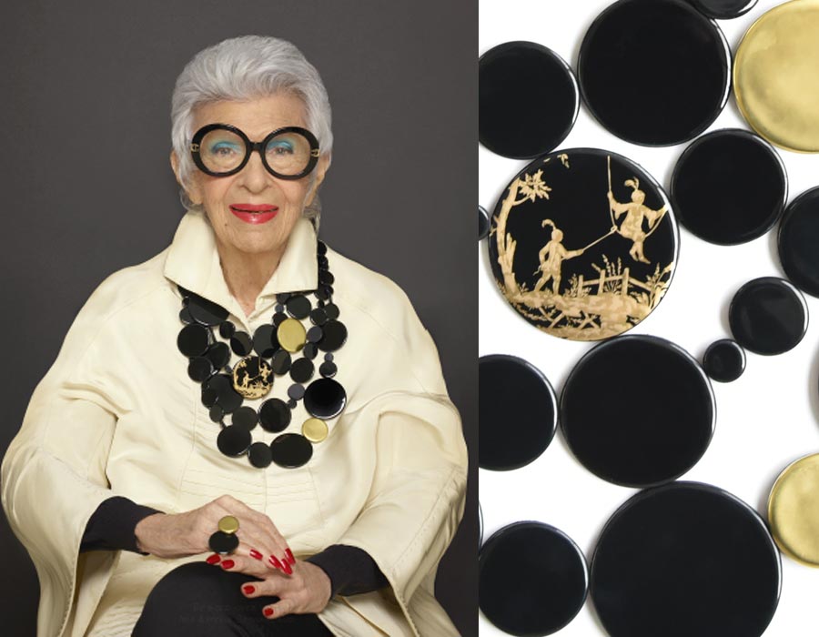 Iris apfel wearing her own creation for Bernardaud, a necklace made with porcelain disks with a gold Chinese pattern